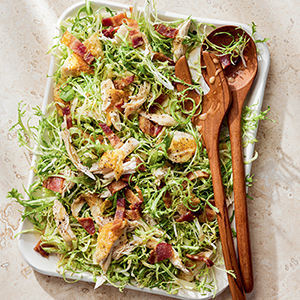 Brussel sprouts and apple salad with chicken and bacon 
