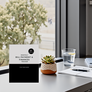 A desk with a laptop, calculator, and a stack of bills and financial documents, representing the pro