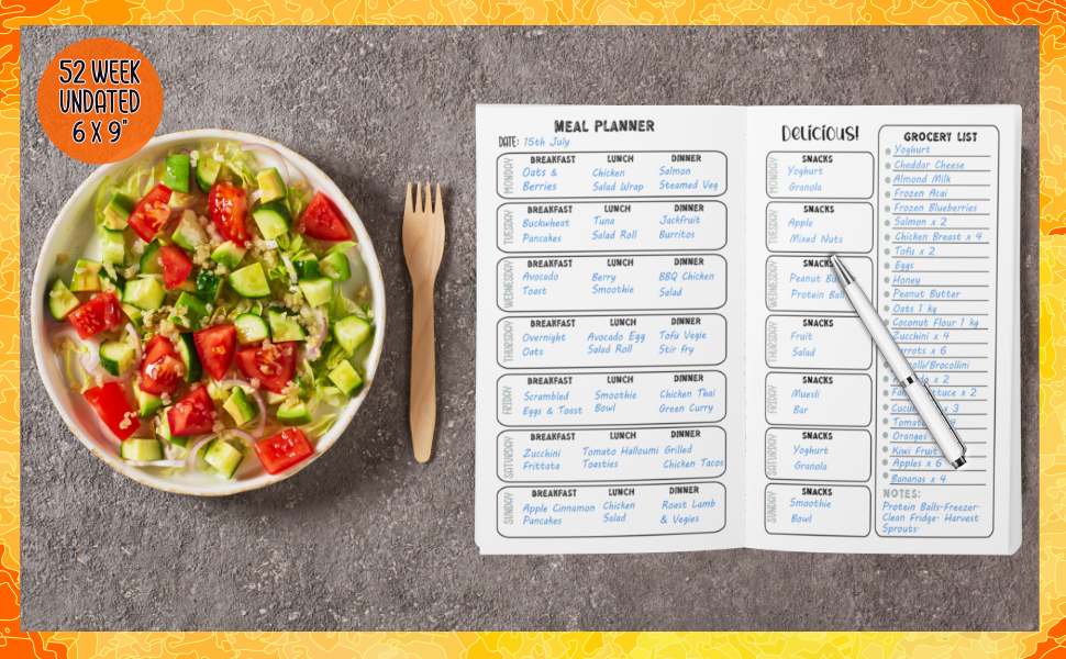 Opened weekly meal planner and salad