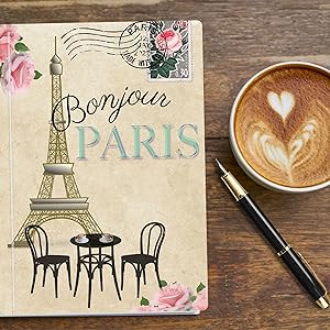 Coffee shop table with Bonjour Paris Journal with Eiffel Tower, French Stamps, coffee, pen