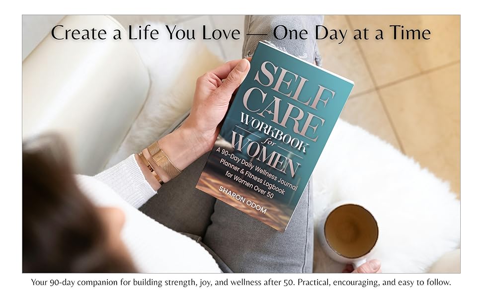 Woman holding the Self Care Workbook for Women and a coffee cup, cozy lifestyle setting.
