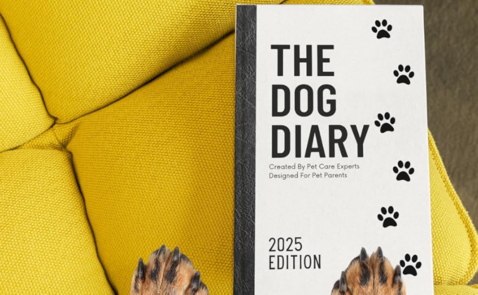 Dog paws on book The Dog Diary yellow couch