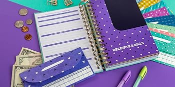 budgeting book with money pockets